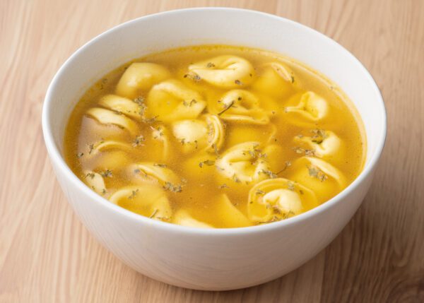 Bowl of tortellini in broth